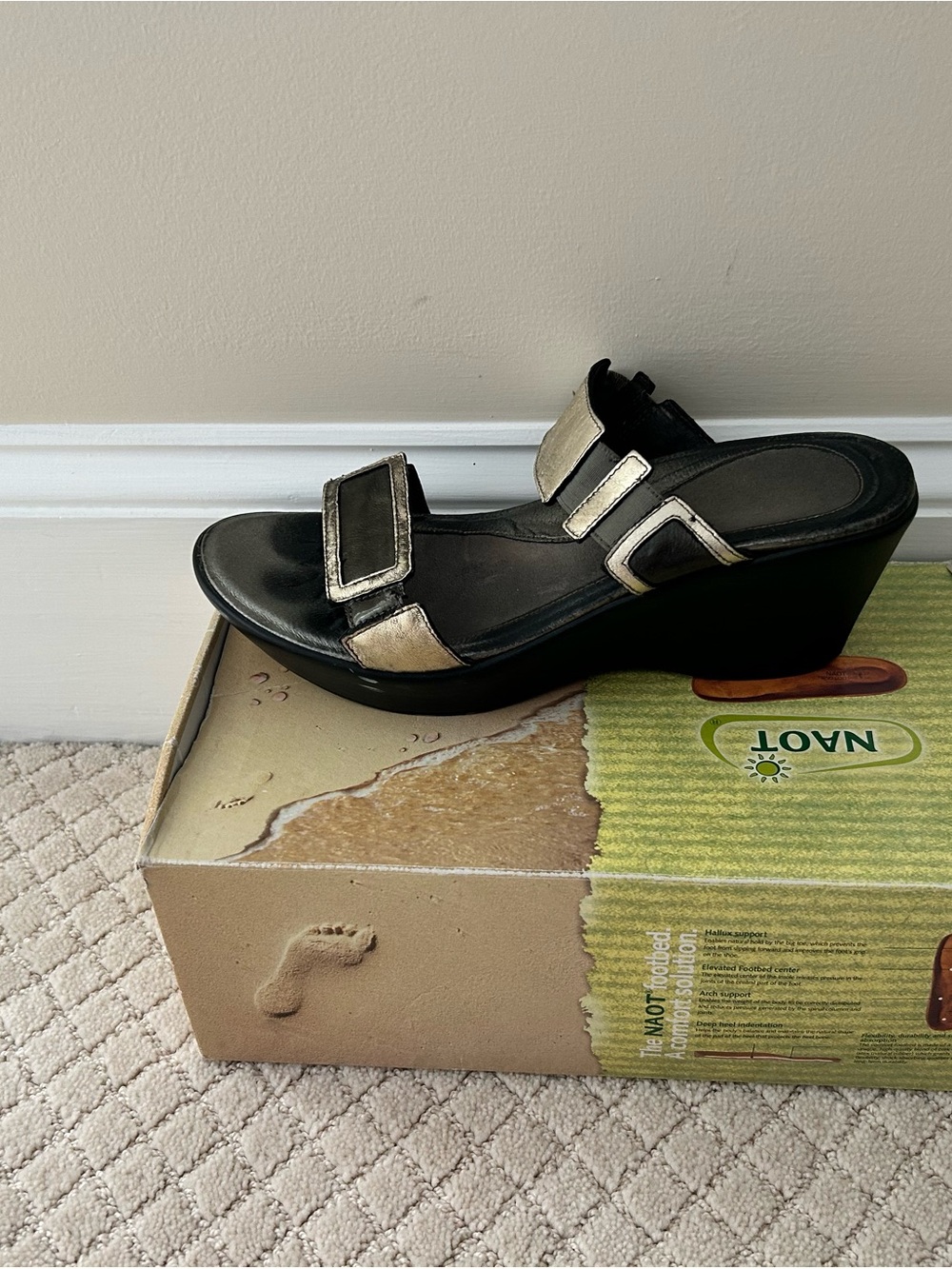 Naot Black Wedge Sandals with Metallic Gold Straps